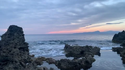 Sunset Over the Rocky Coast Stock Footage 303362781