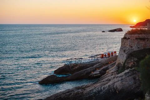 Sunset Over Rocky Coastal Cliffs Stock Photos