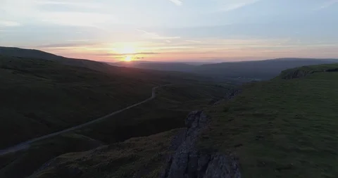 Sunset over a rocky valley Stock Footage 87063462