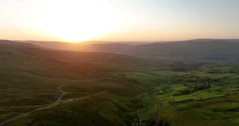 Sunset over rolling hills in Yorkshire Dales Stock Footage 282937589
