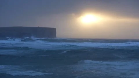 Sunset over rough seas in Orkney in 4K Video stock 280701429