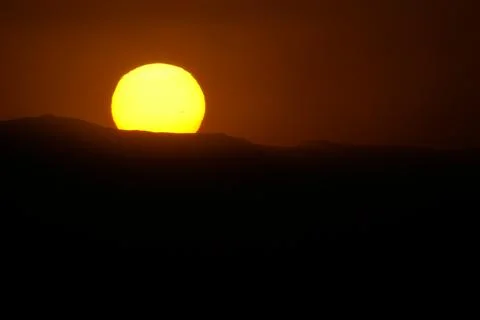 Sunset Over Rugged Mountains captured in Rassudr, Egypt Stock Photos