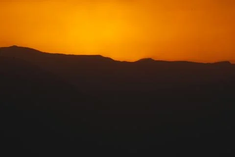 Sunset Over Rugged Mountains captured in Rassudr, Egypt Stock Photos