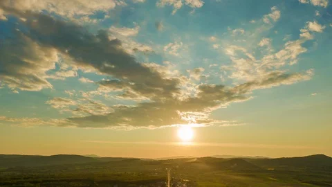 Sunset over rural land hyperlapse Stock Footage 129635517