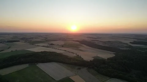 Sunset over rural landscape in Germany (Baden-Wuerttemberg) - Up-Mov-Clip Stock Footage 245597316