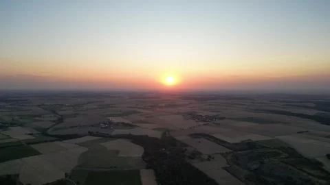 Sunset over rural landscape in Germany (Baden-Wuerttemberg) - Up-Move-Clip Stock Footage 245597407