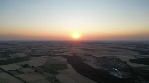 Sunset over rural landscape in Germany (Baden-Wuerttemberg) - Zoom-In-Clip Stock-Footage 245597476