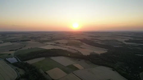 Sunset over rural landscape in Germany (Baden-Wuerttemberg) - Zoom-In-Clip Stock Footage 245597900