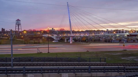 Sunset over the Sabo Bridge and Traffic in Minneapolis Stock Footage 73461130