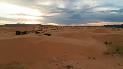 Sunset over the sand dunes in the desert Video stock 113259568