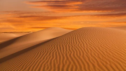 Sunset over the sand dunes in the desert 스톡 동영상 127613043