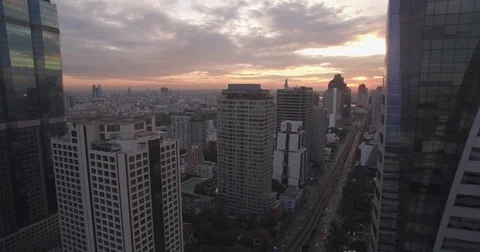 Sunset Over Sathorn Road, Central Bangkok, Thailand, Aerial Drone Shot Stock Footage 76033462