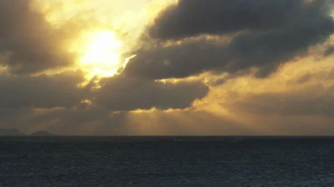 Sunset Over the Sea with Clouds and Rays of Light Stock Footage 332819272