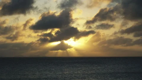 Sunset Over the Sea with Clouds and Rays of Light Stock Footage 332819291