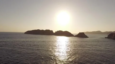 Sunset over Sea with Distant Island Silhouettes, Aerial Drone View, Wide Shot Vídeo Stock 340627606