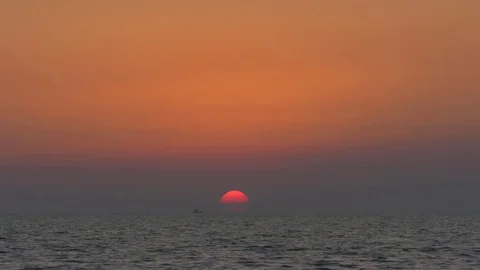 Sunset over the sea Stock Footage 79605648