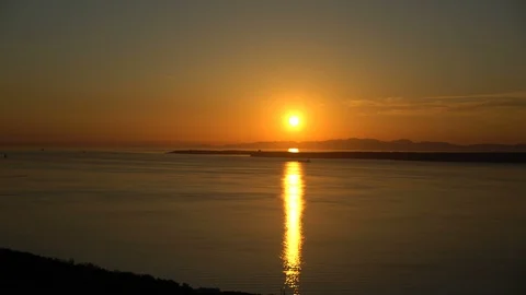 Sunset over the sea Stockbeeldmateriaal 112440601