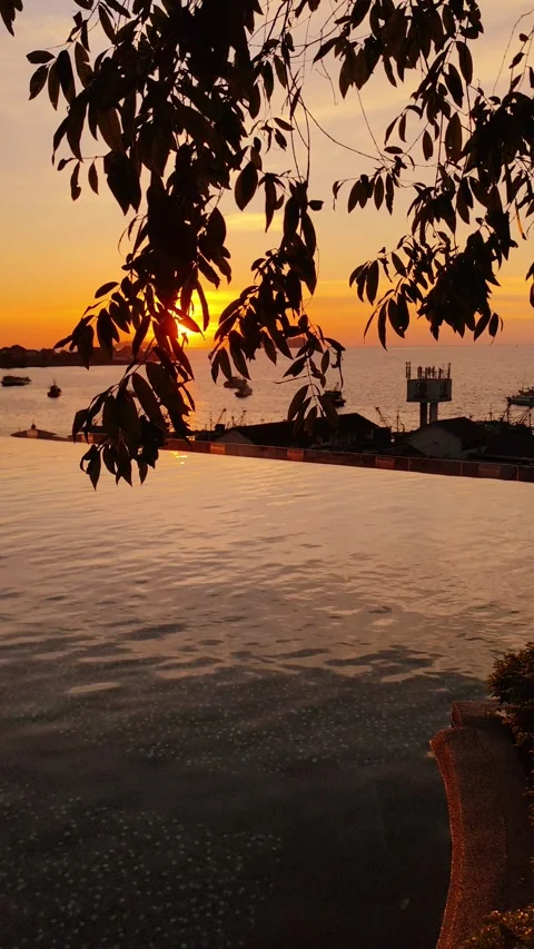 Sunset Over The Sea With Infinity Pool In Kota Kinabalu, Borneo Stock Footage 327894563
