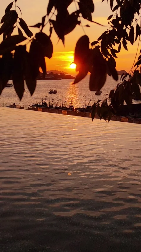 Sunset Over The Sea With Infinity Pool In Kota Kinabalu, Borneo Stock Footage 327894684
