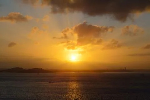 Sunset over sea. Light path on the water Stock Photos