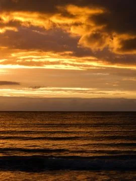 Sunset over the sea Stock Photos