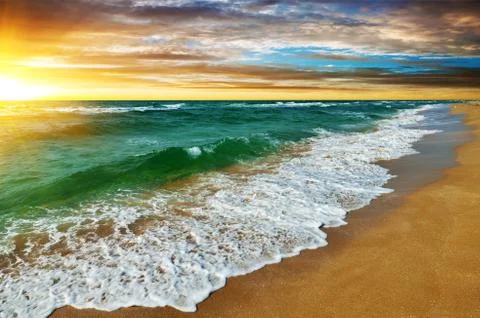 Sunset over the sea Stock Photos