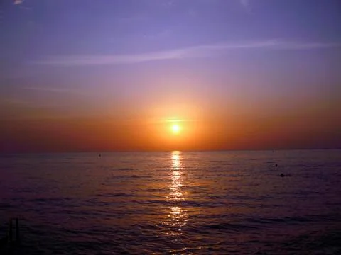 Sunset over the sea Stock Photos