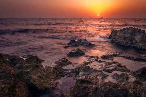 Sunset over the sea Stock Photos