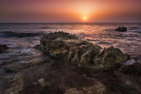 Sunset over the sea Stock Photos