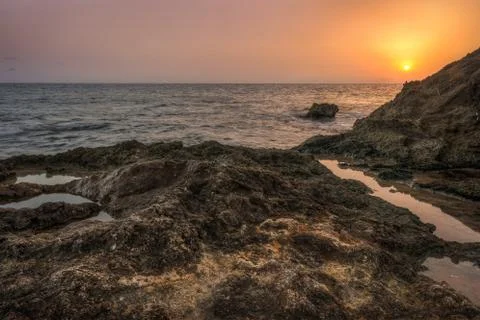 Sunset over the sea Stock Photos