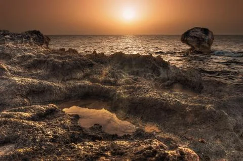 Sunset over the sea Stock Photos