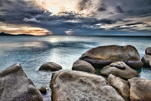 Sunset over sea Stock Photos