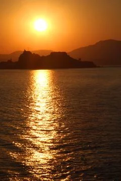 Sunset over the sea Stock Photos