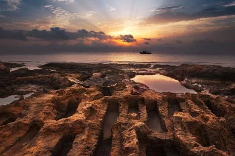 Sunset over the sea Stock Photos