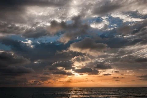 Sunset over the sea Stock Photos