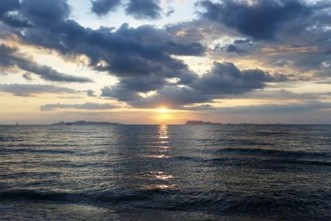 Sunset over sea Stock Photos