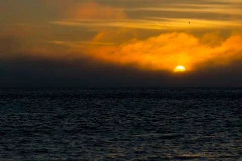 Sunset over the sea Stock Photos