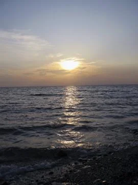 Sunset over the sea Stock Photos