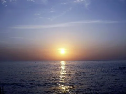 Sunset over the sea Stock Photos
