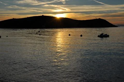 Sunset over the sea Stock Photos