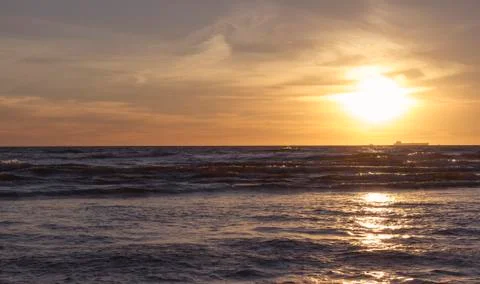 Sunset over sea Stock Photos