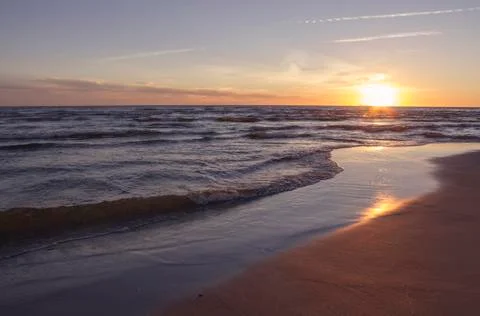 Sunset over sea Stock Photos