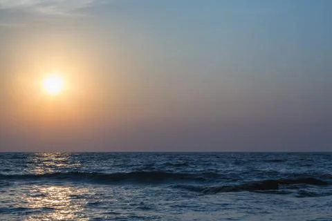 Sunset over sea Stock Photos