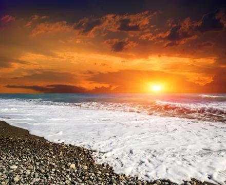 Sunset over sea Stock Photos