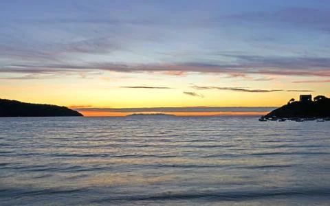 Sunset over the sea Stock Photos