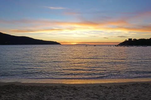 Sunset over the sea Stock Photos