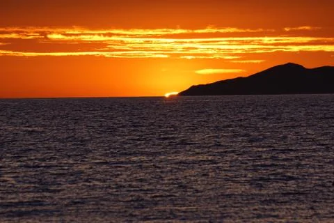 Sunset over the sea Stock Photos