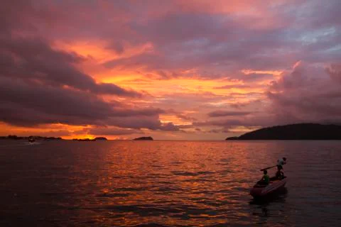 Sunset over the sea Stock Photos