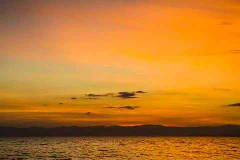 Sunset over the sea Stock Photos