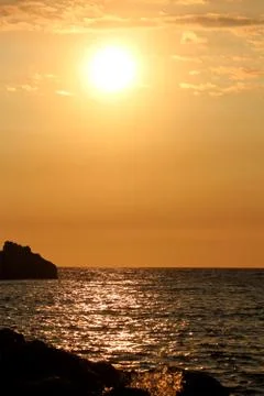 Sunset over the sea Stock Photos